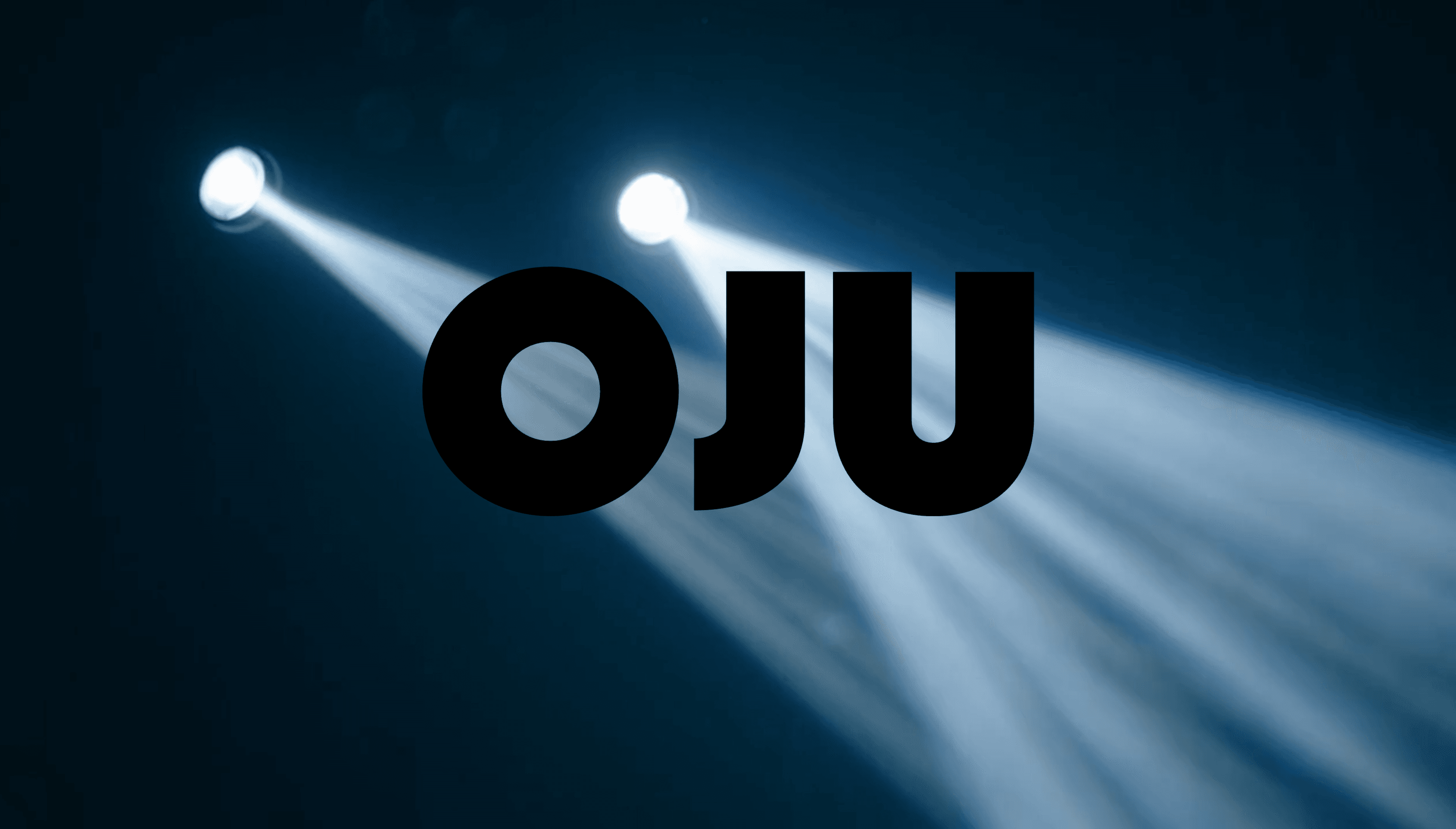 OJU entry screen: the black OJU wordmark centered over a dark blue field crossed by two beams of stage light.